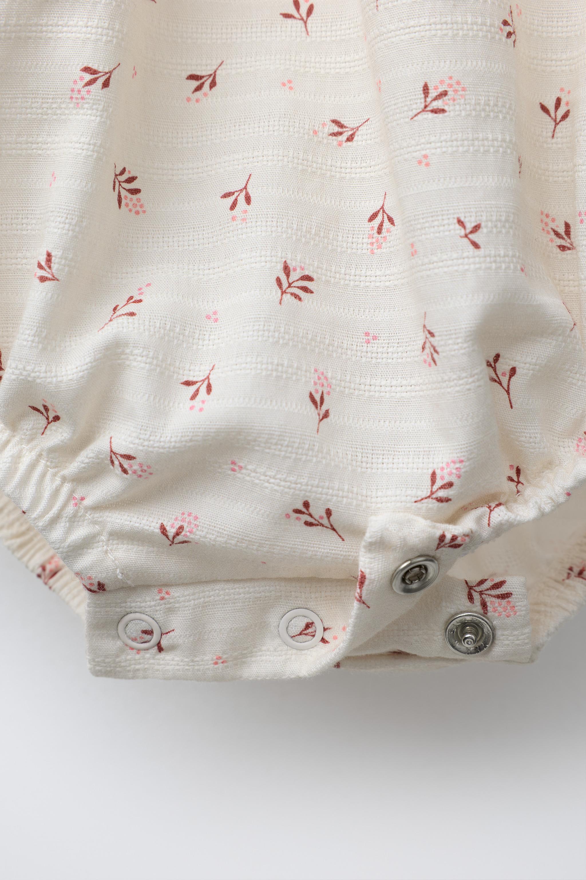 LACE TRIM FLORAL BODYSUIT